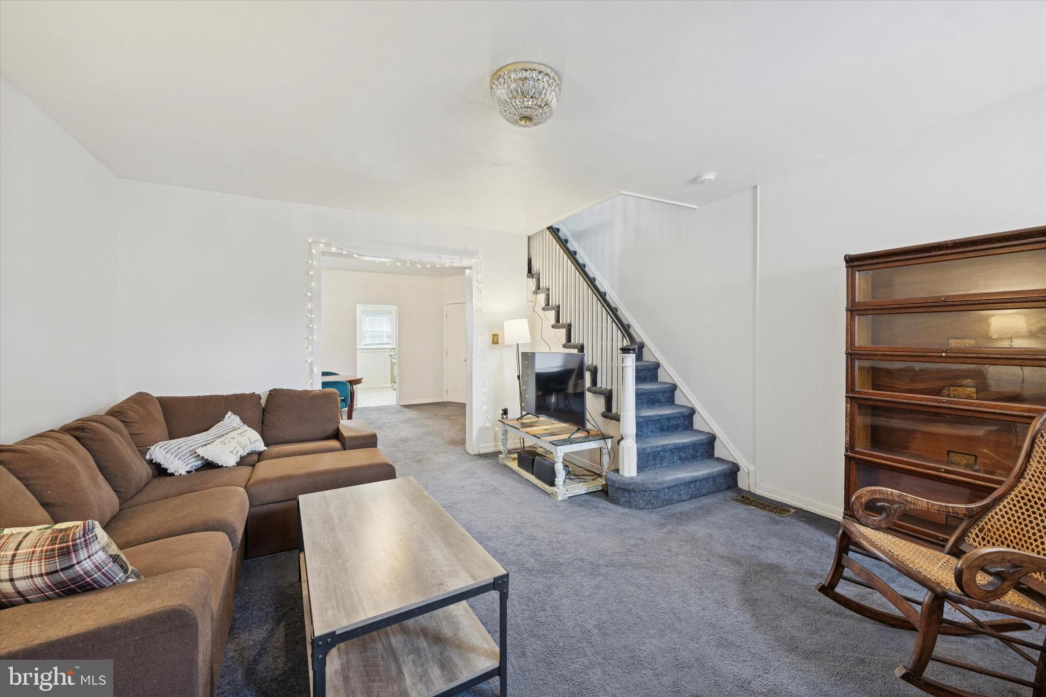 5624 North Warnock Street Philadelphia, PA 19141 - Photo 5 of 15 a living room with furniture and a ceiling fan