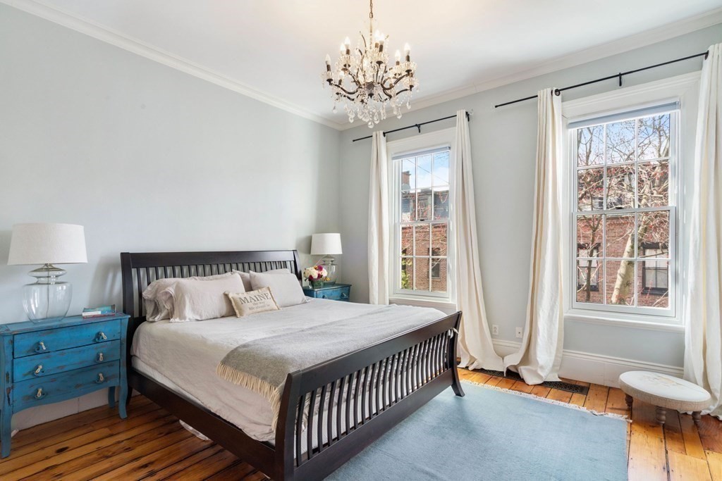 12 Cedar Street Boston, MA 02129 - Photo 14 of 23 a bedroom with a bed and a window