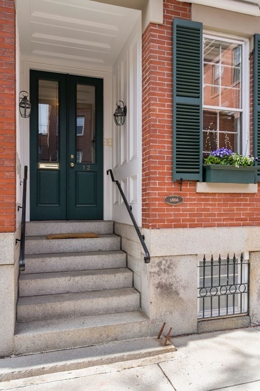 12 Cedar Street Boston, MA 02129 - Photo 20 of 23 a view of a house with a window and stairs