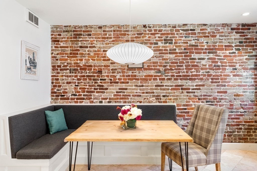 12 Cedar Street Boston, MA 02129 - Photo 8 of 23 a view of a dining room with furniture