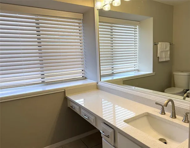 a bathroom with a sink and a bathtub