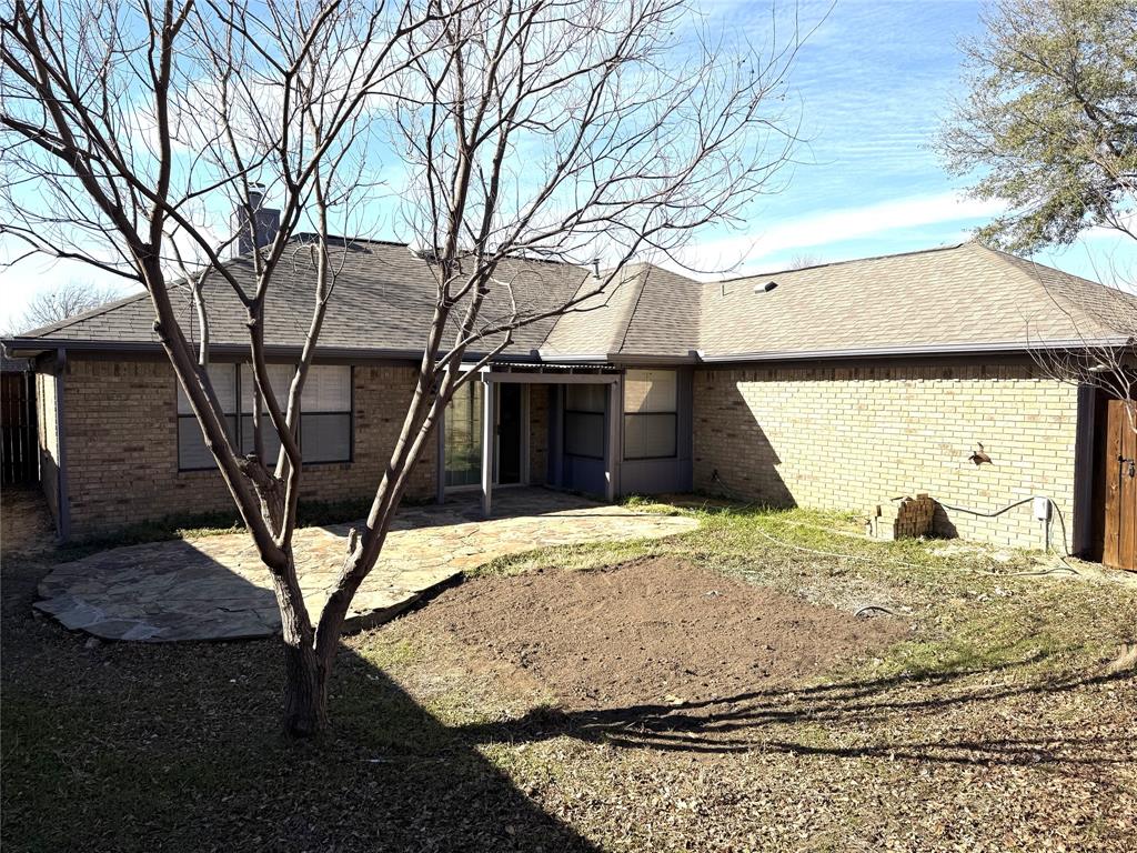 652 Harrison Drive Coppell, TX 75019 - Photo 23 of 26 a house with trees in front of it
