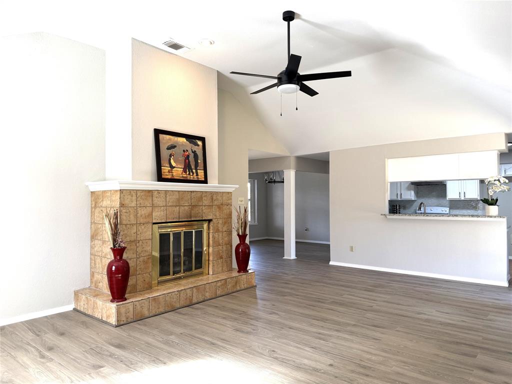 652 Harrison Drive Coppell, TX 75019 - Photo 6 of 26 a living room with a fireplace