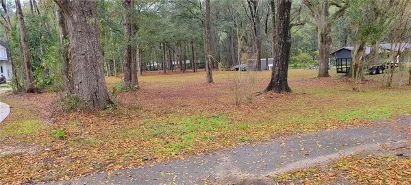 a view of road with trees
