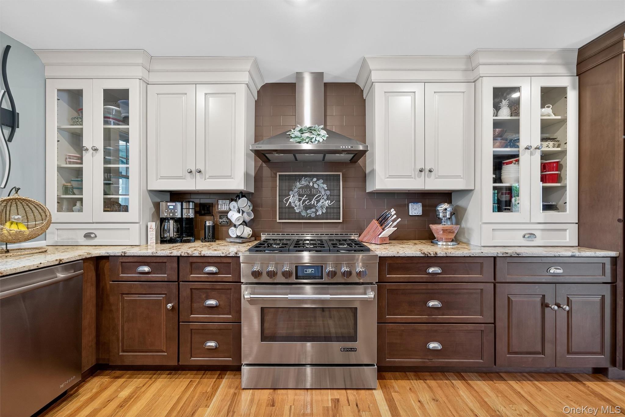 91 Distillery Road Warwick, NY 10990 - Photo 12 of 49 a kitchen with stainless steel appliances granite countertop a stove and cabinets