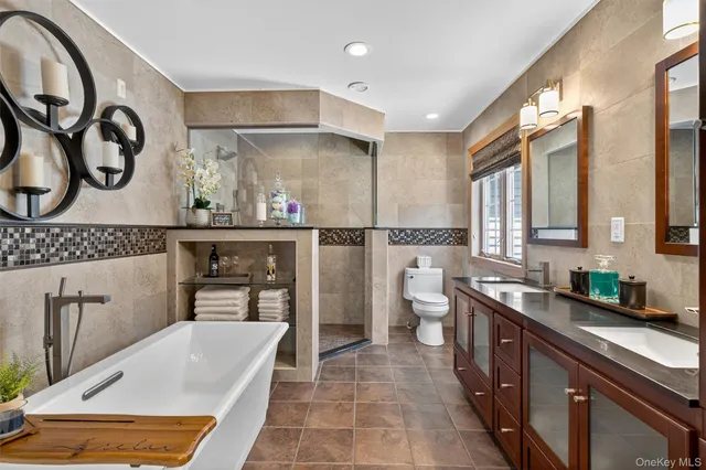 a kitchen with stainless steel appliances a sink and cabinets