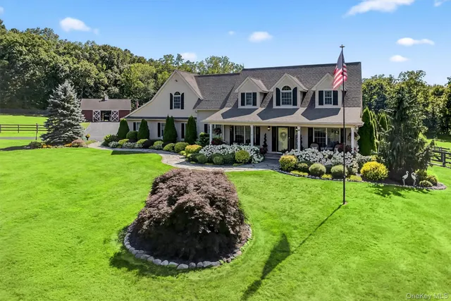 a house view with a garden space