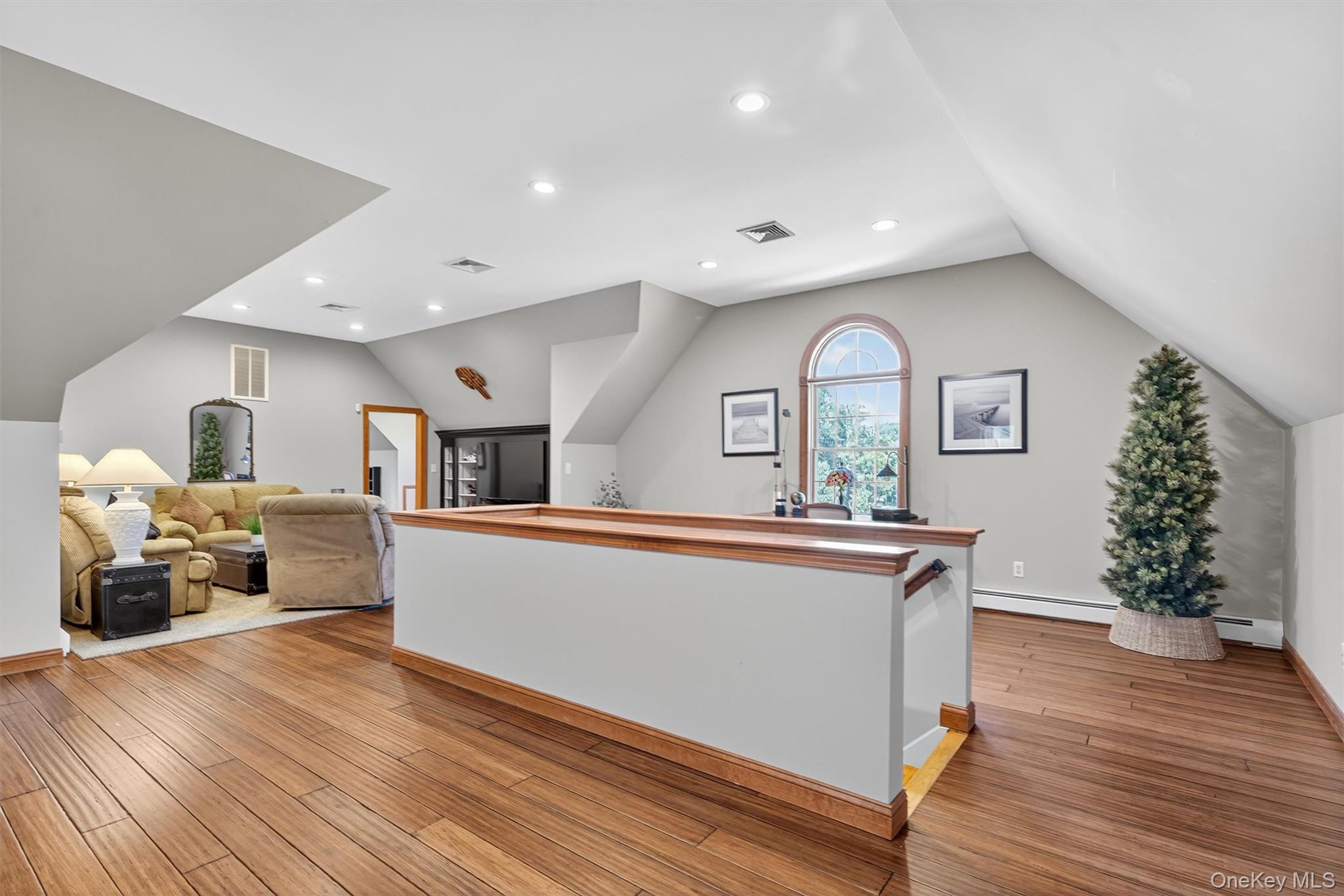 91 Distillery Road Warwick, NY 10990 - Photo 22 of 49 a living room with furniture and a wooden floor