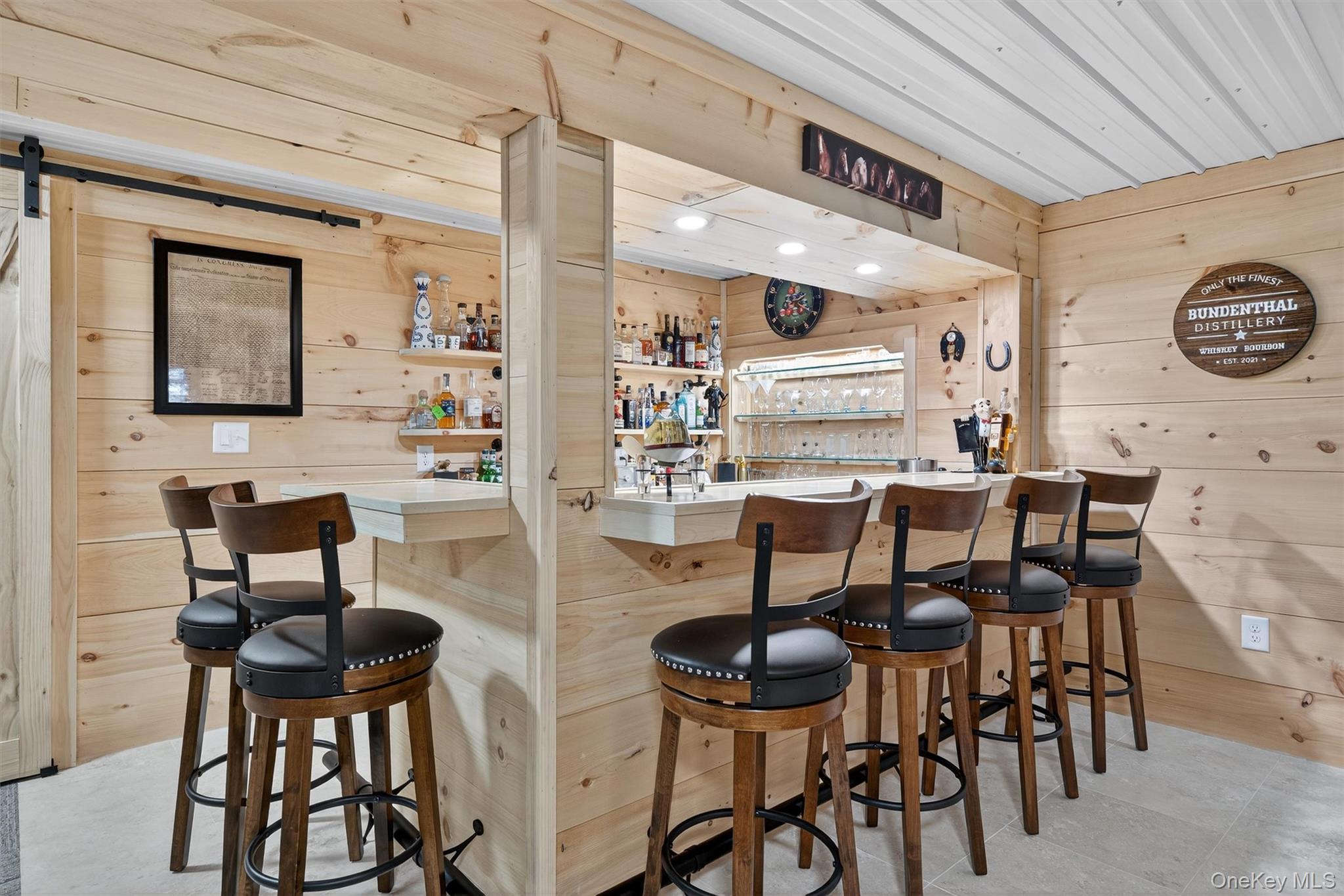 91 Distillery Road Warwick, NY 10990 - Photo 28 of 49 a view of a dining room with furniture and chandelier