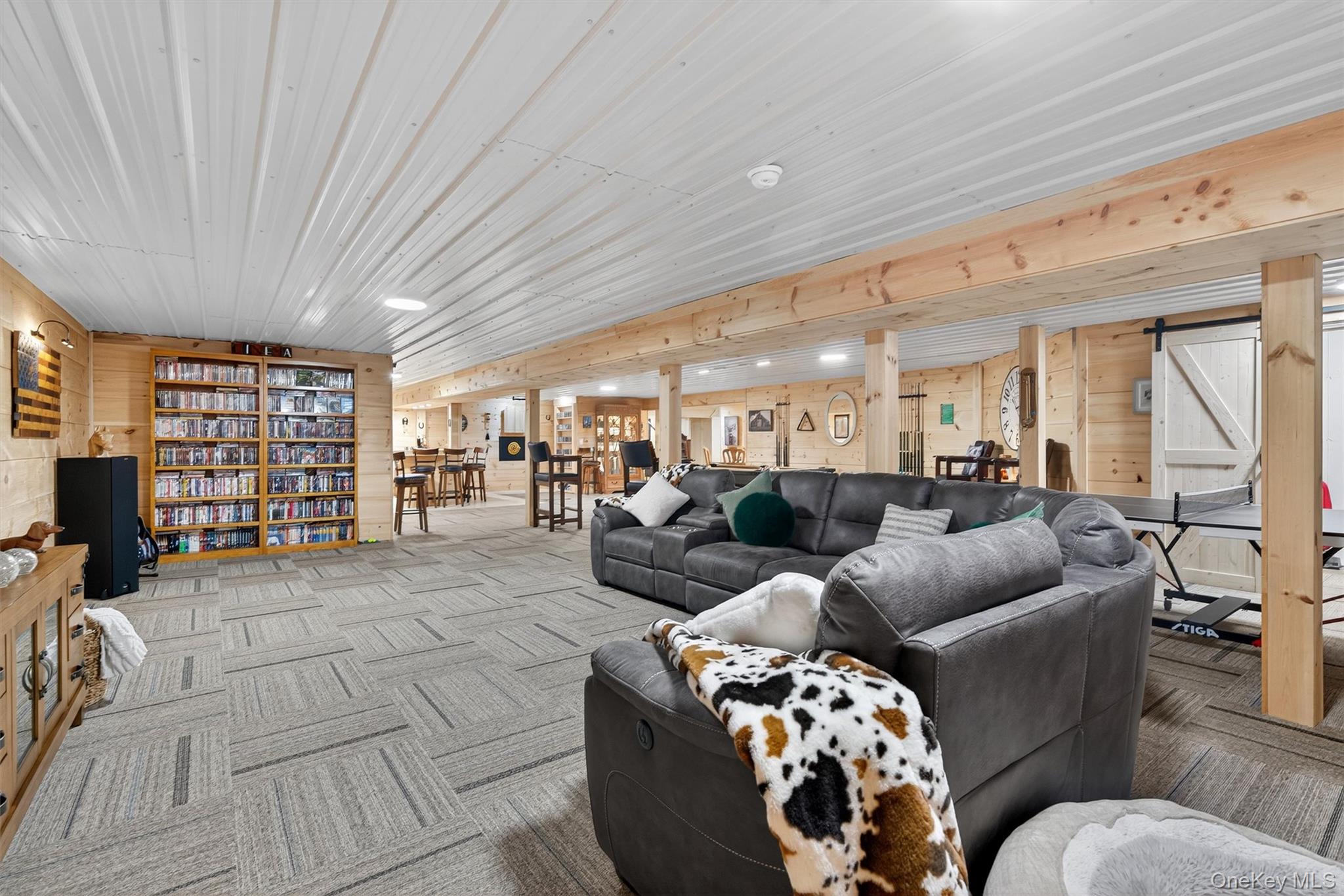 91 Distillery Road Warwick, NY 10990 - Photo 31 of 49 a living room with furniture and a flat screen tv