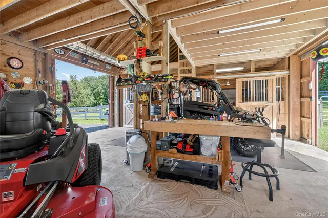 a view of a garage with a table and chairs