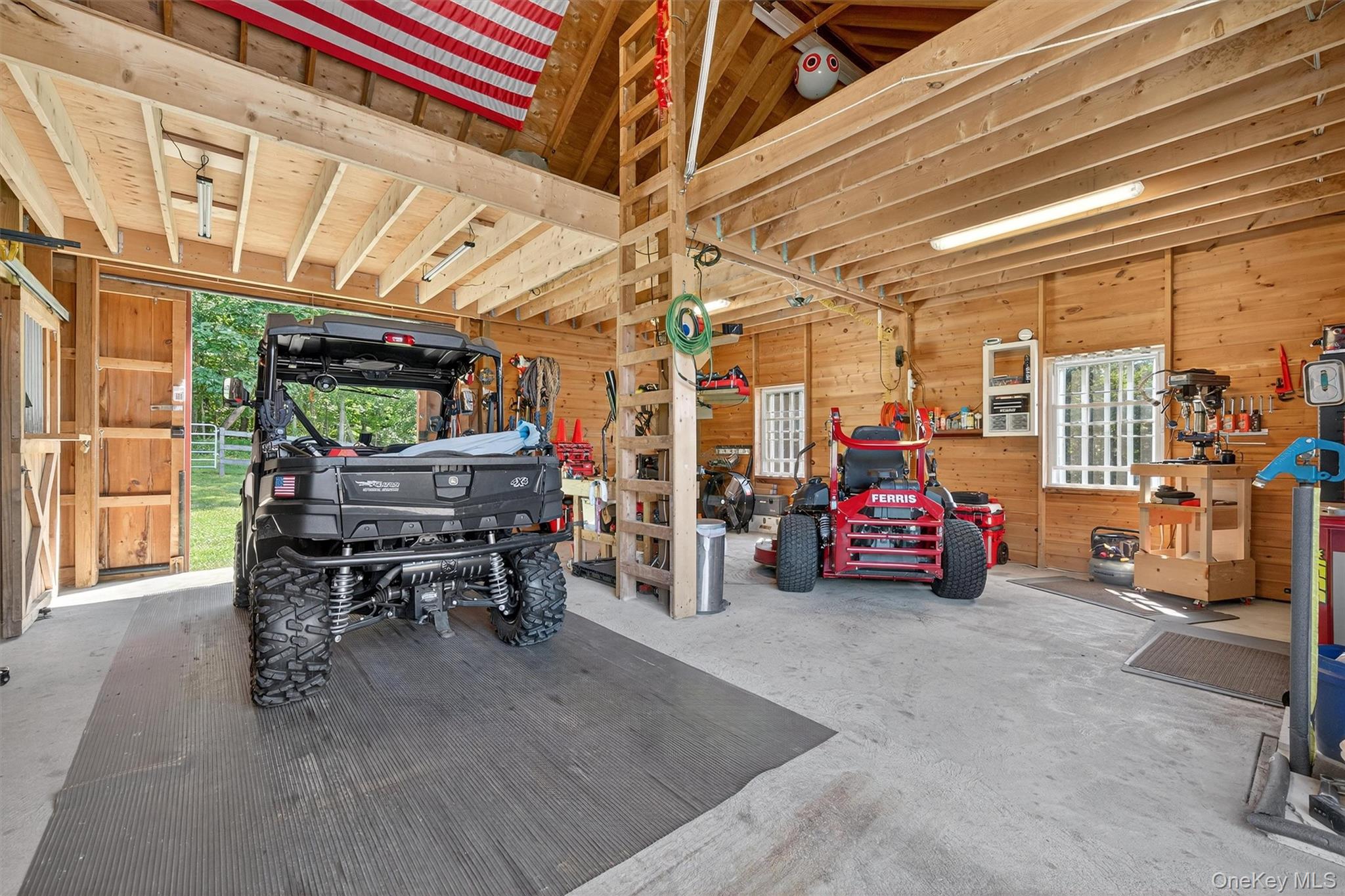 91 Distillery Road Warwick, NY 10990 - Photo 37 of 49 a view of a garage with a table and chairs