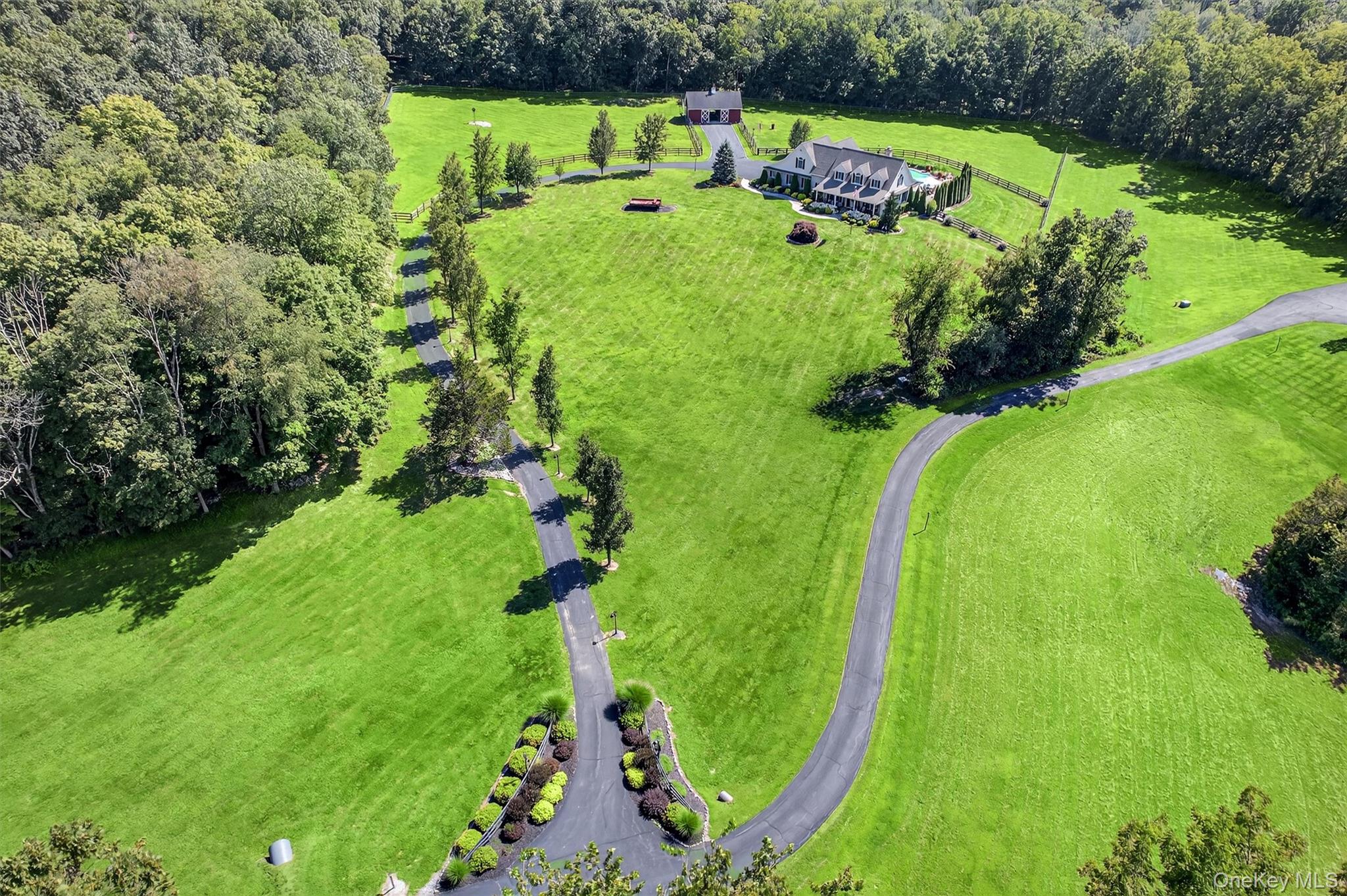 91 Distillery Road Warwick, NY 10990 - Photo 45 of 49 an aerial view of a golf course with parking space