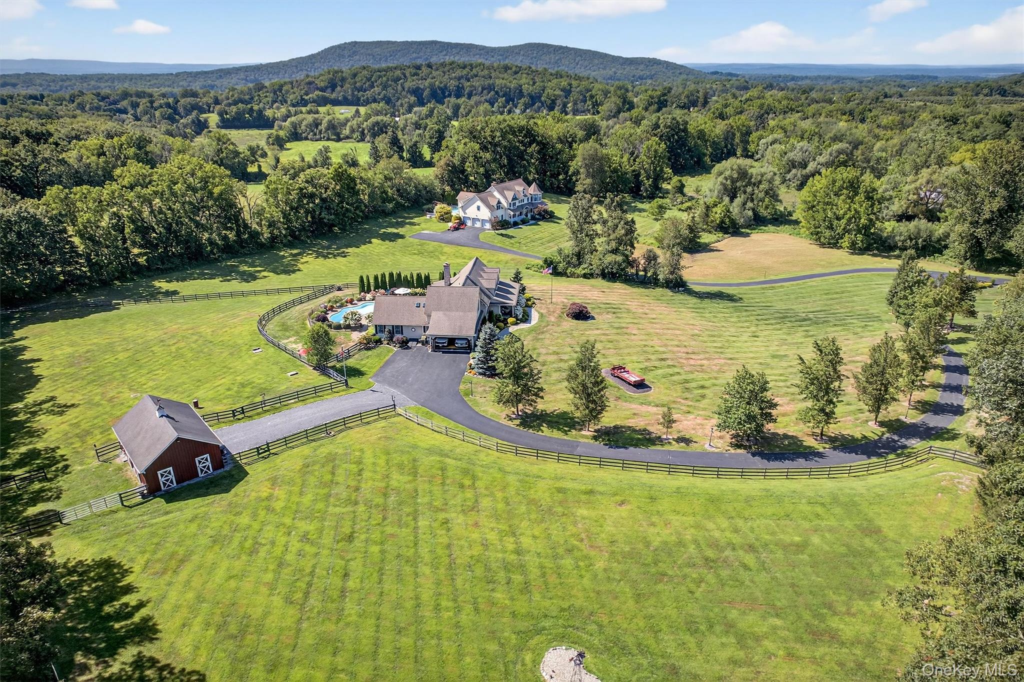 91 Distillery Road Warwick, NY 10990 - Photo 47 of 49 a view of a swimming pool and mountain view