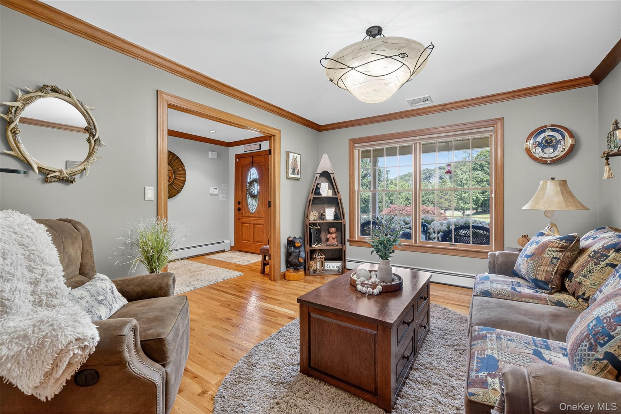 91 Distillery Road Warwick, NY 10990 - Photo 5 of 49 a living room with furniture and a large window