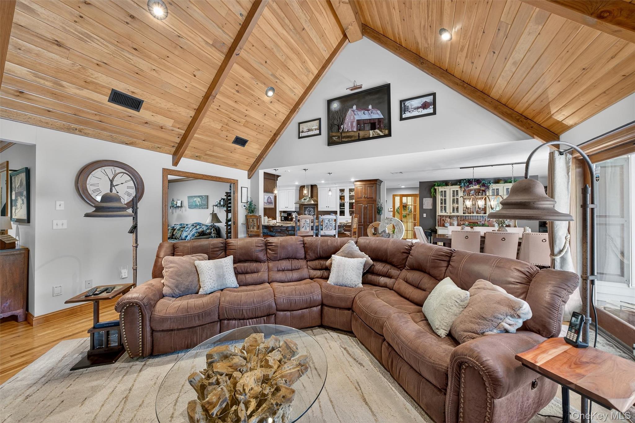 91 Distillery Road Warwick, NY 10990 - Photo 9 of 49 a living room with furniture and a clock