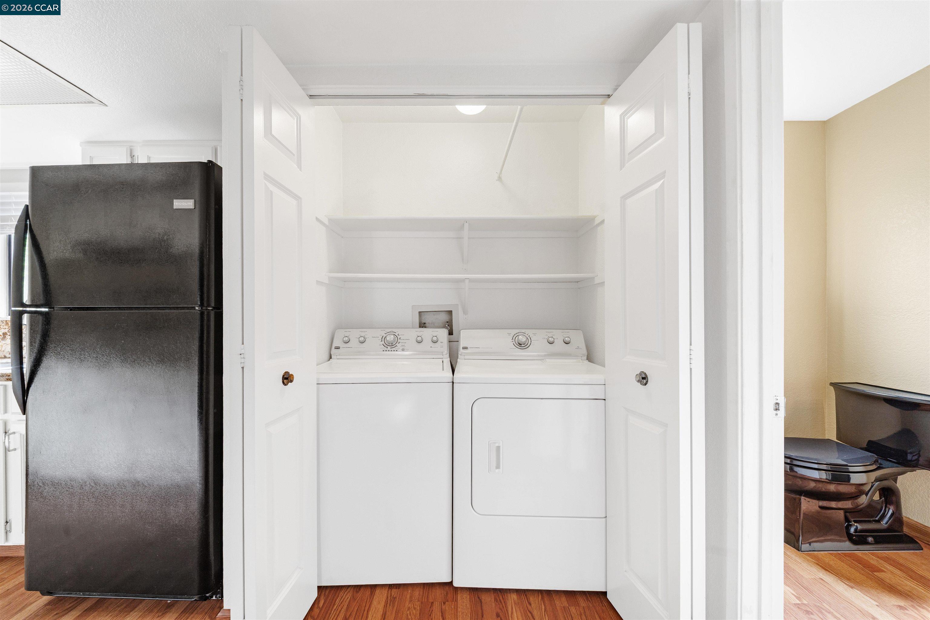 2055 Sierra Road, Unit 106 Concord, CA 94518 - Photo 12 of 37 a view of storage and utility room with washer and dryer