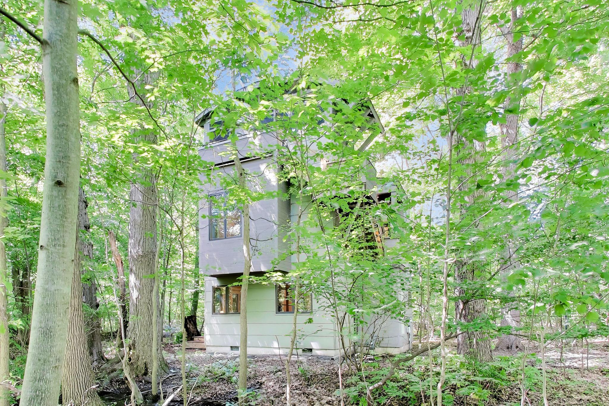 44 Tryon Farm Lane Michigan City, IN 46360 - Photo 2 of 37 a view of a house with a tree