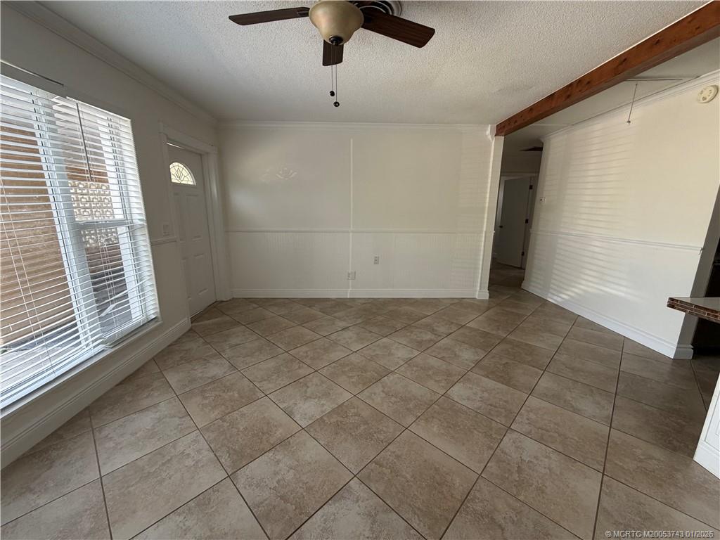 820 Northwest 10th Terrace Stuart, FL 34994 - Photo 11 of 21 a view of an empty room with a window