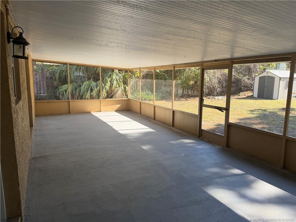 820 Northwest 10th Terrace Stuart, FL 34994 - Photo 7 of 21 a view of an empty room with a large window