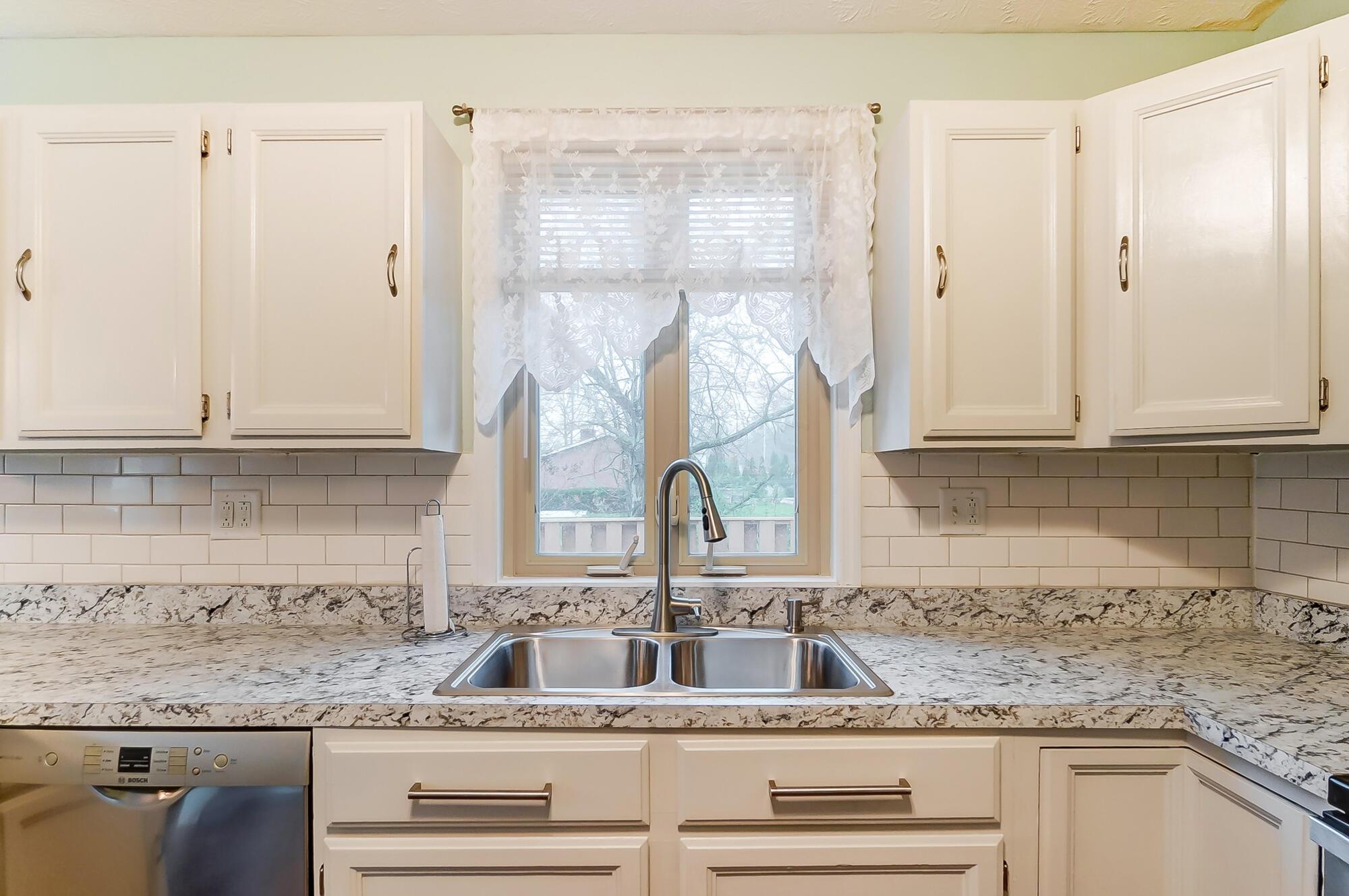 6964 Taylor Road Southwest Reynoldsburg, OH 43068 - Photo 18 of 42 Taylor Rd SW Kitchen Sink and Window