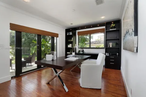 a bathroom with a sink vanity and a toilet