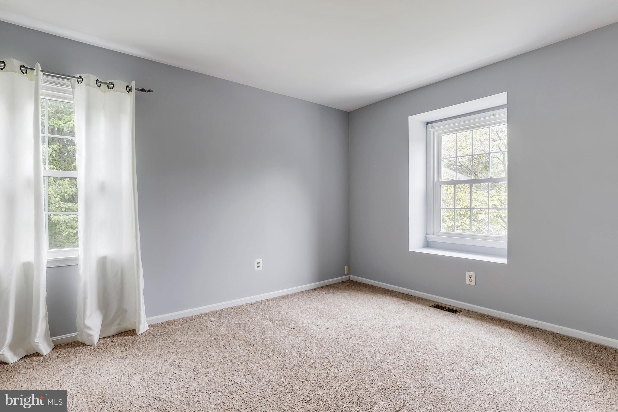 14201 Catamount Court Silver Spring, MD 20906 - Photo 20 of 29 Spacious Secondary Bedroom w/ new closet doors