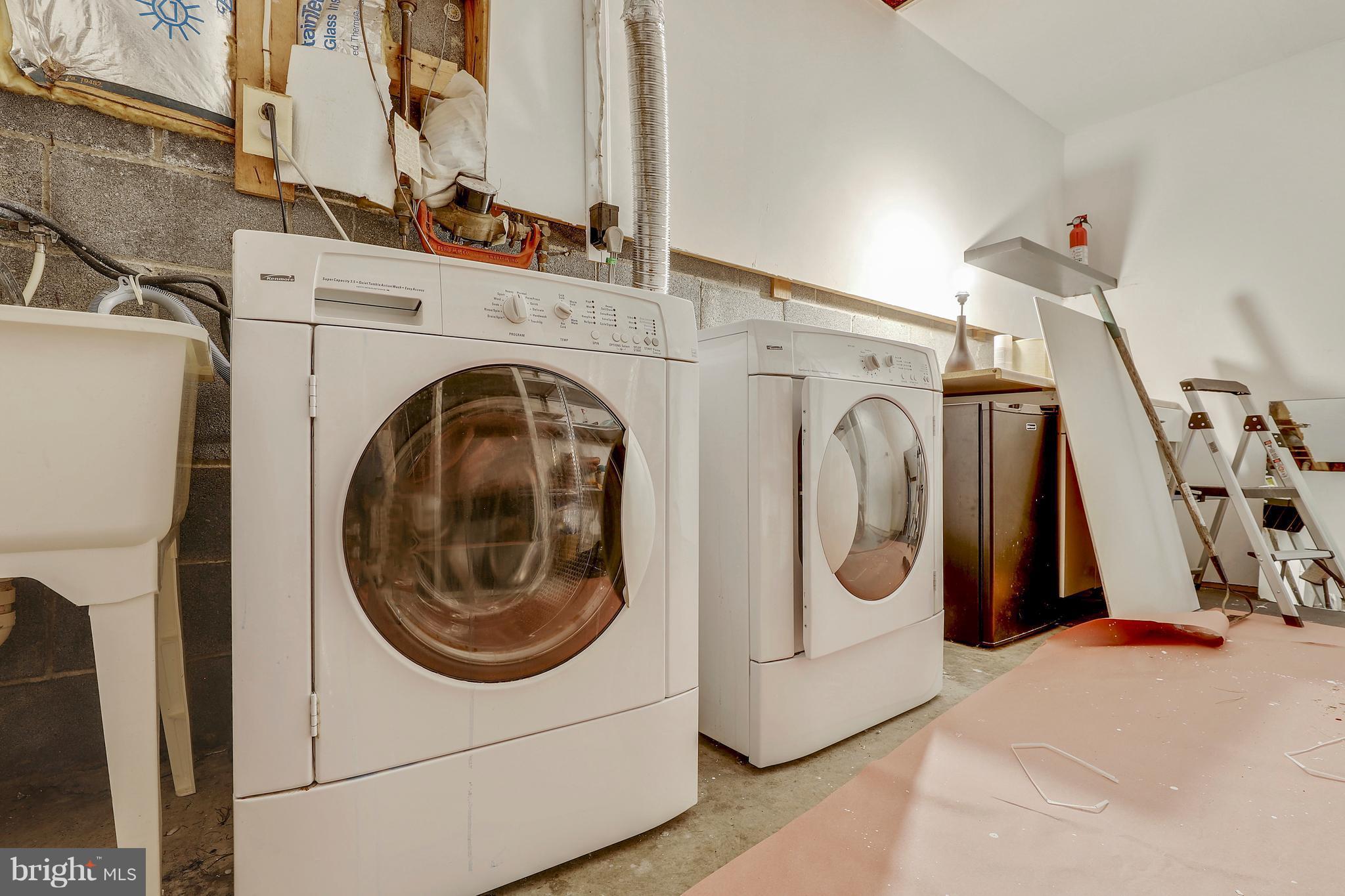 14201 Catamount Court Silver Spring, MD 20906 - Photo 24 of 29 Laundry Room and Storage Area