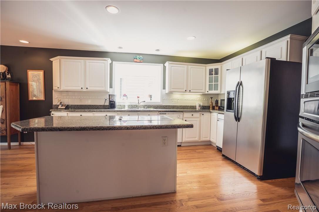 3147 Fairgrove Terrace, Unit 7 Rochester, MI 48309 - Photo 26 of 52 GENEROUS RECESSED LIGHTING THRU OUT THE HOME