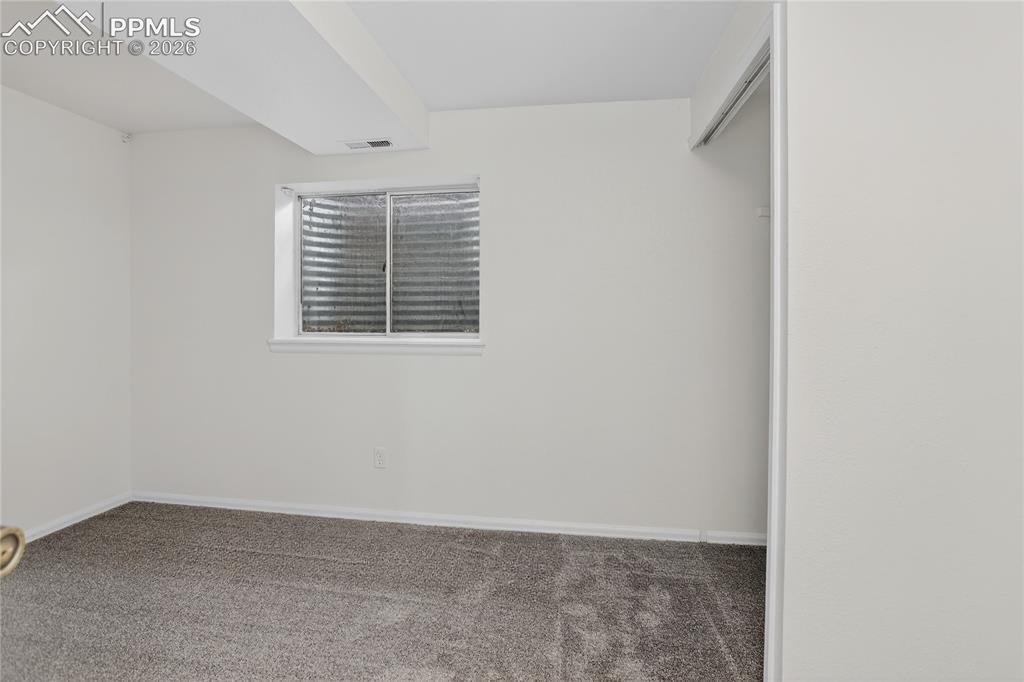 4770 Spacewalk Way Colorado Springs, CO 80916 - Photo 13 of 17 Bedroom 3 - lower level