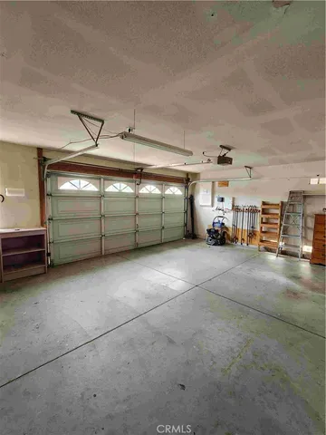 a view of parking garage with car parked