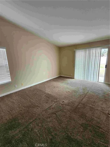 a view of a room with an empty space
