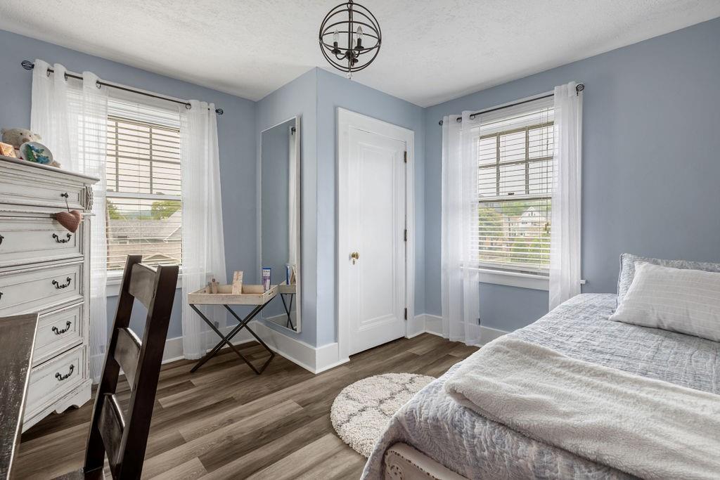 200 Orchard Street Beaver, PA 15009 - Photo 20 of 28 a bedroom with a bed and a table in it
