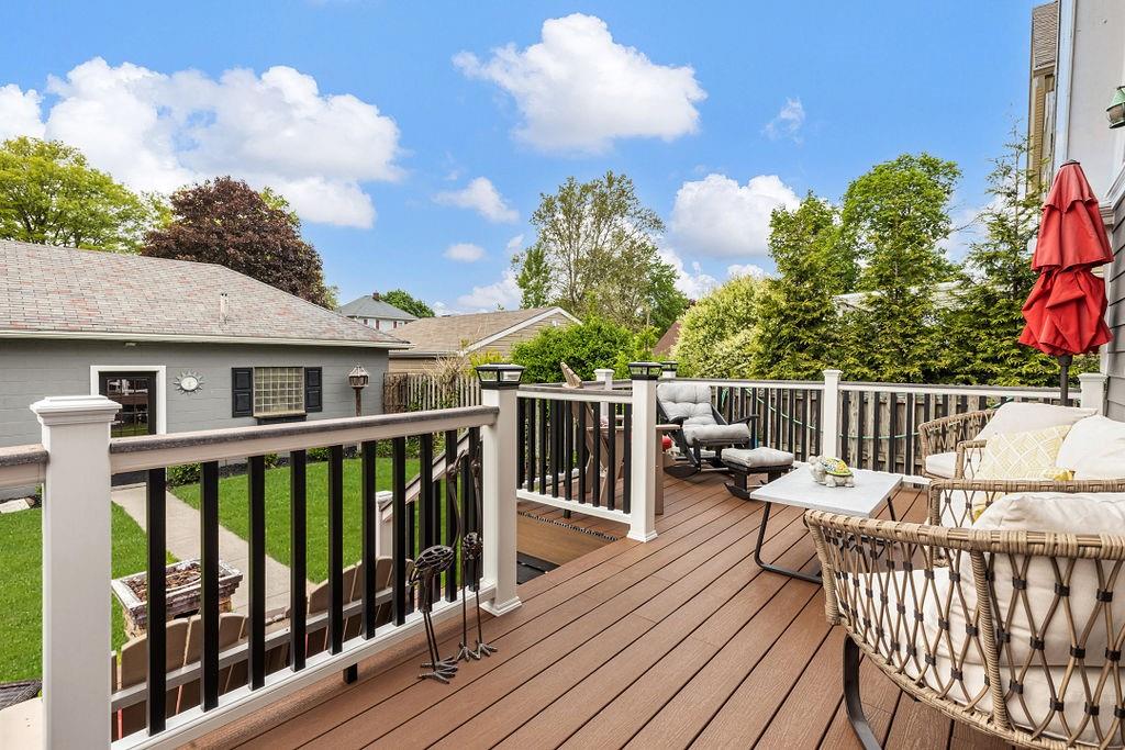 200 Orchard Street Beaver, PA 15009 - Photo 24 of 28 a view of a deck with two chair and wooden floor