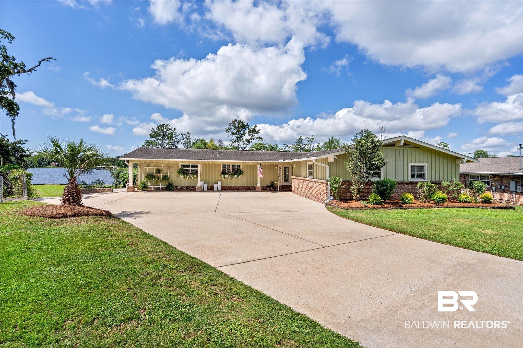 3801 Point Road Mobile, AL 36619 - Photo 4 of 55 Ranch-style residence featuring light green siding and brick veneer