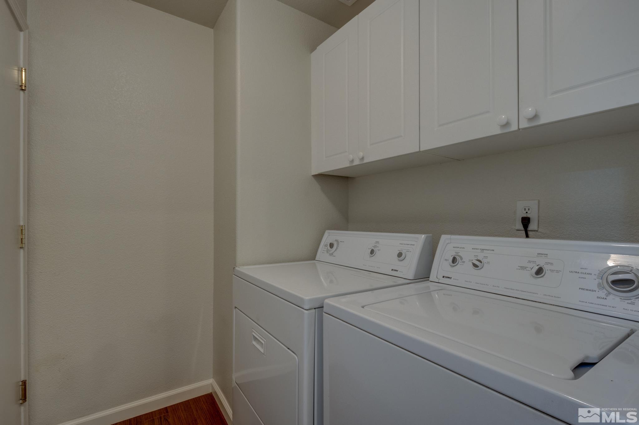 10695 Vista Bonita Lane Reno, NV 89521 - Photo 14 of 31 a utility room with dryer and washer