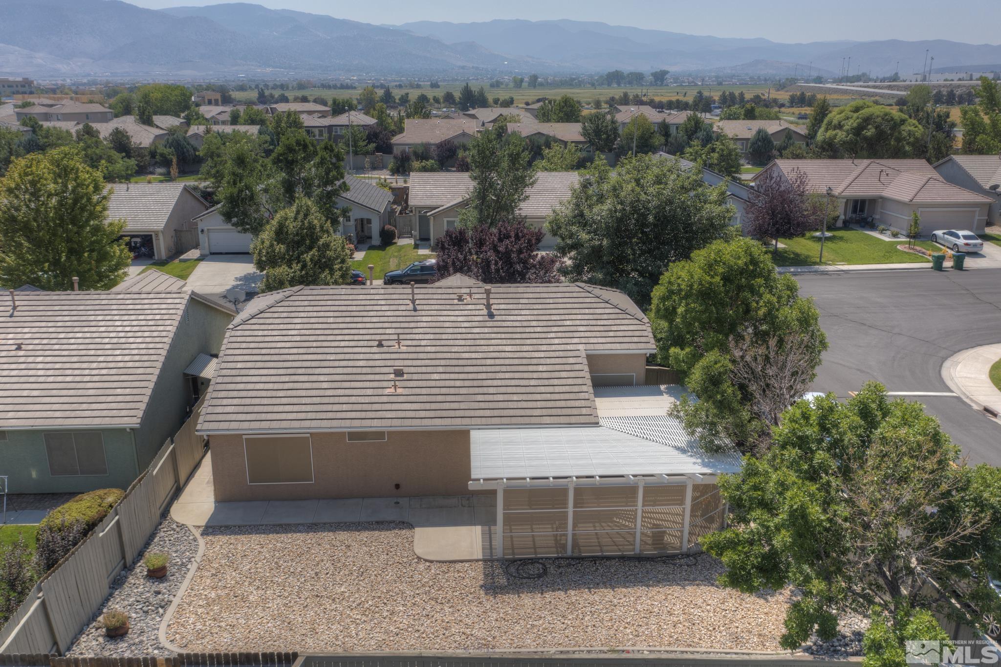10695 Vista Bonita Lane Reno, NV 89521 - Photo 30 of 31 an aerial view of a house with a yard