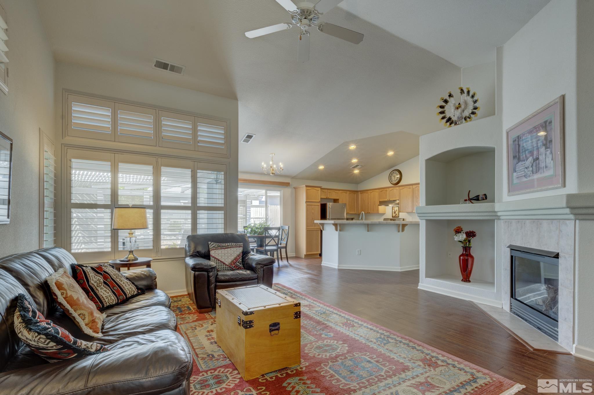 10695 Vista Bonita Lane Reno, NV 89521 - Photo 6 of 31 a living room with furniture and a fireplace