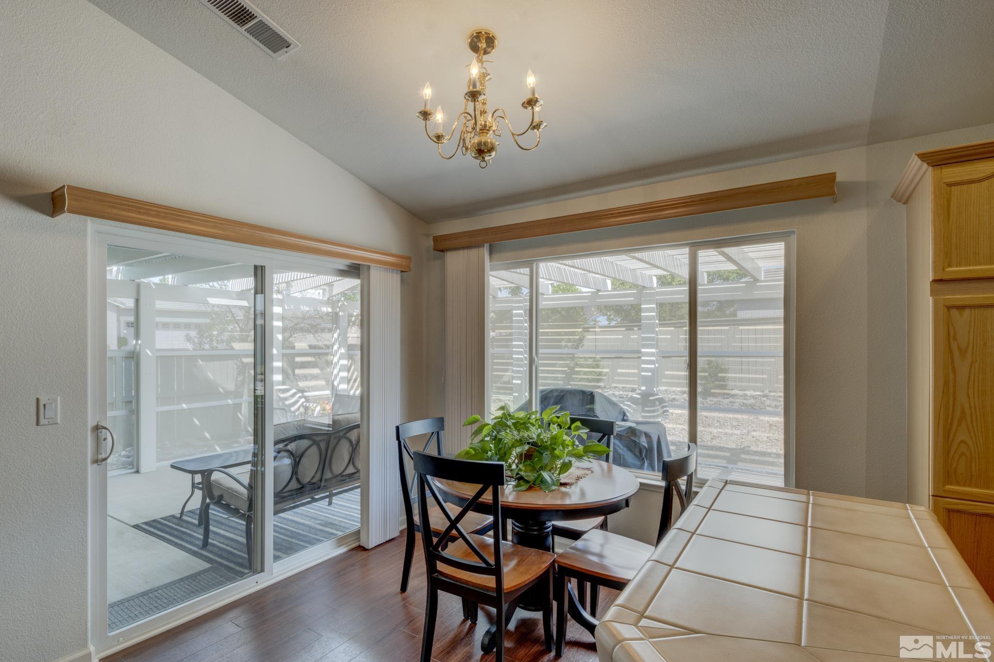 10695 Vista Bonita Lane Reno, NV 89521 - Photo 9 of 31 a dining room with furniture and window
