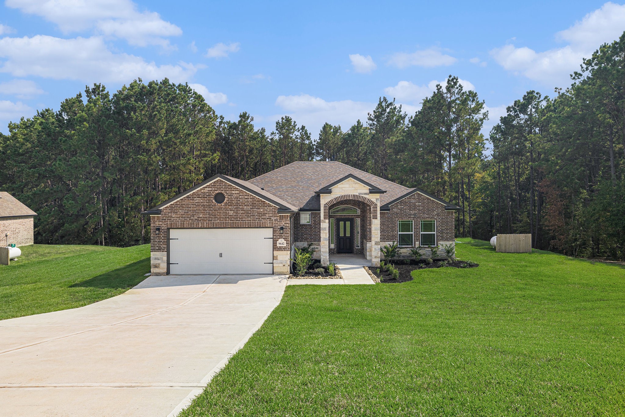 9642 Moss Rose Lane Willis, TX 77378 - Photo 1 of 37 READY NOW!! Gorgeous Brand New 1 Story Home! "Maverick" plan. Hurry, call today for a tour