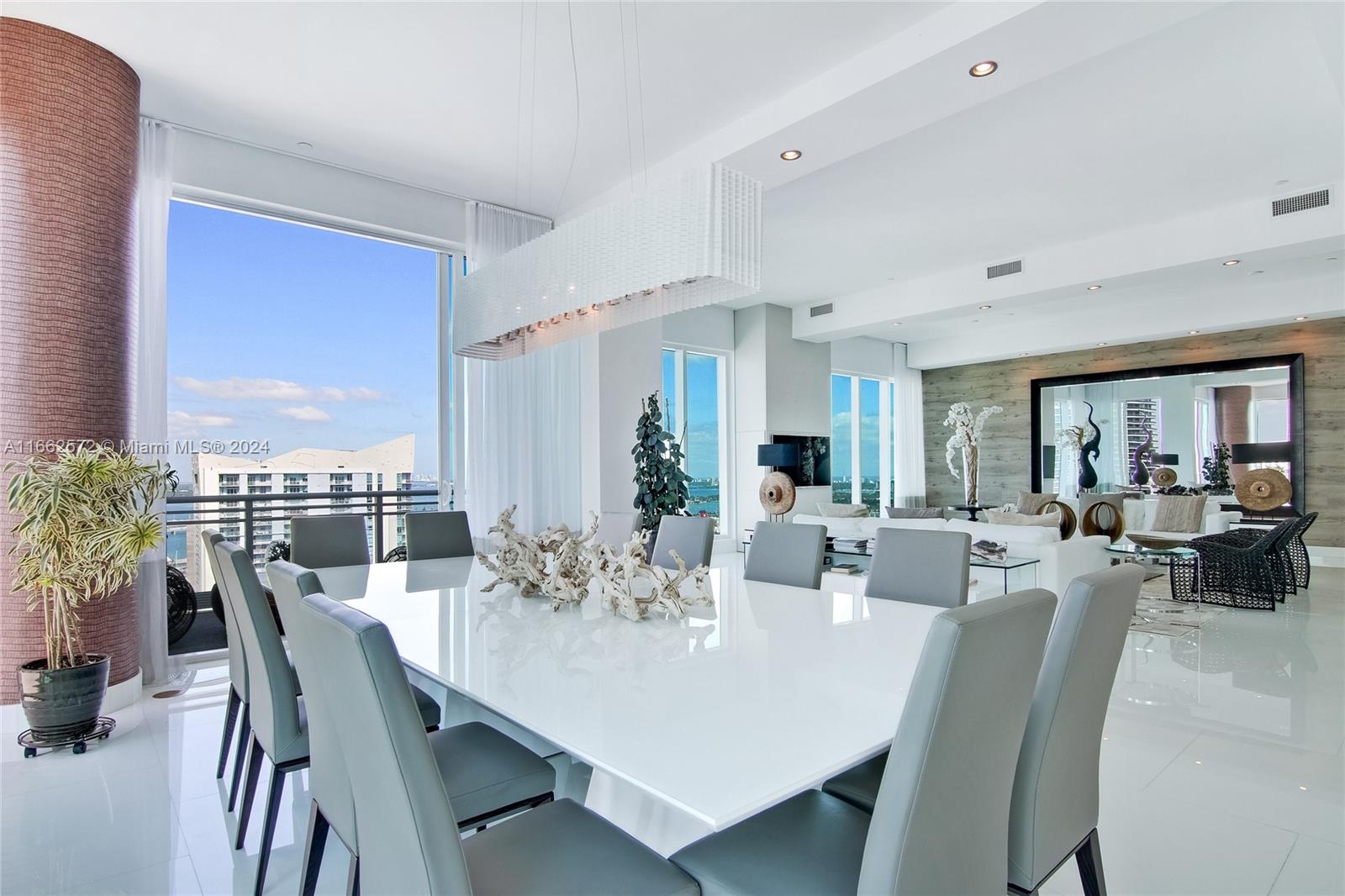 900 Brickell Key Boulevard, Unit PH3401 Miami, FL 33131 - Photo 13 of 58 a view of a dining room with furniture window and outdoor view