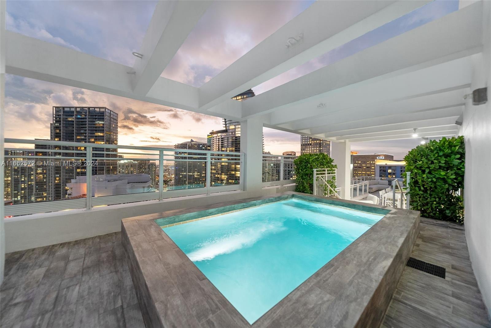 900 Brickell Key Boulevard, Unit PH3401 Miami, FL 33131 - Photo 34 of 58 a view of a porch and yard