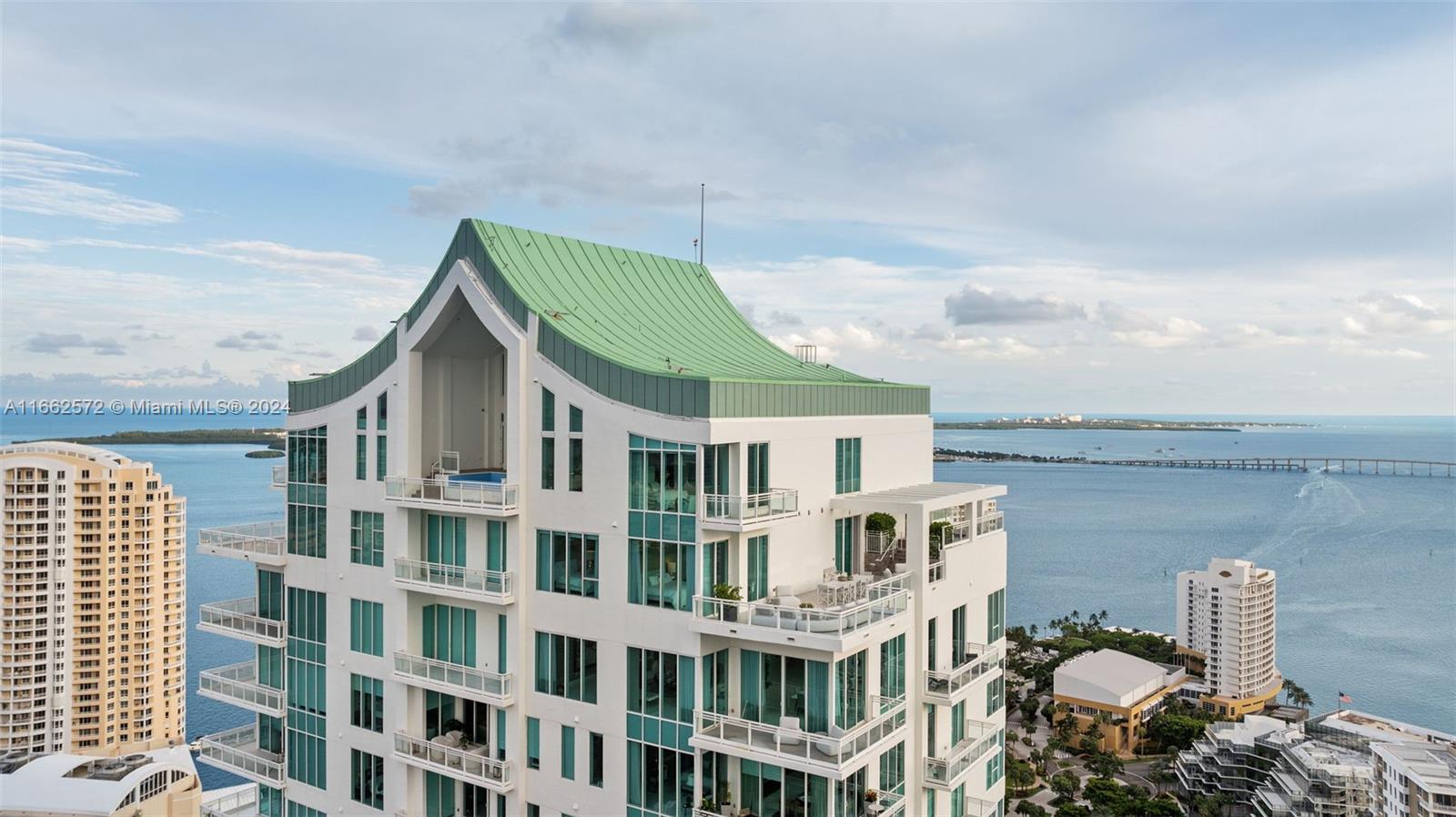 900 Brickell Key Boulevard, Unit PH3401 Miami, FL 33131 - Photo 38 of 58 a front view of a residential apartment building
