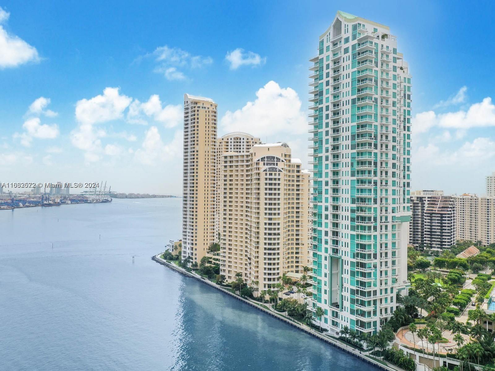 900 Brickell Key Boulevard, Unit PH3401 Miami, FL 33131 - Photo 39 of 58 a view of a city with tall buildings