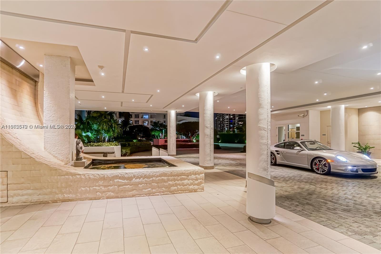 900 Brickell Key Boulevard, Unit PH3401 Miami, FL 33131 - Photo 43 of 58 a view of a living room and entry way