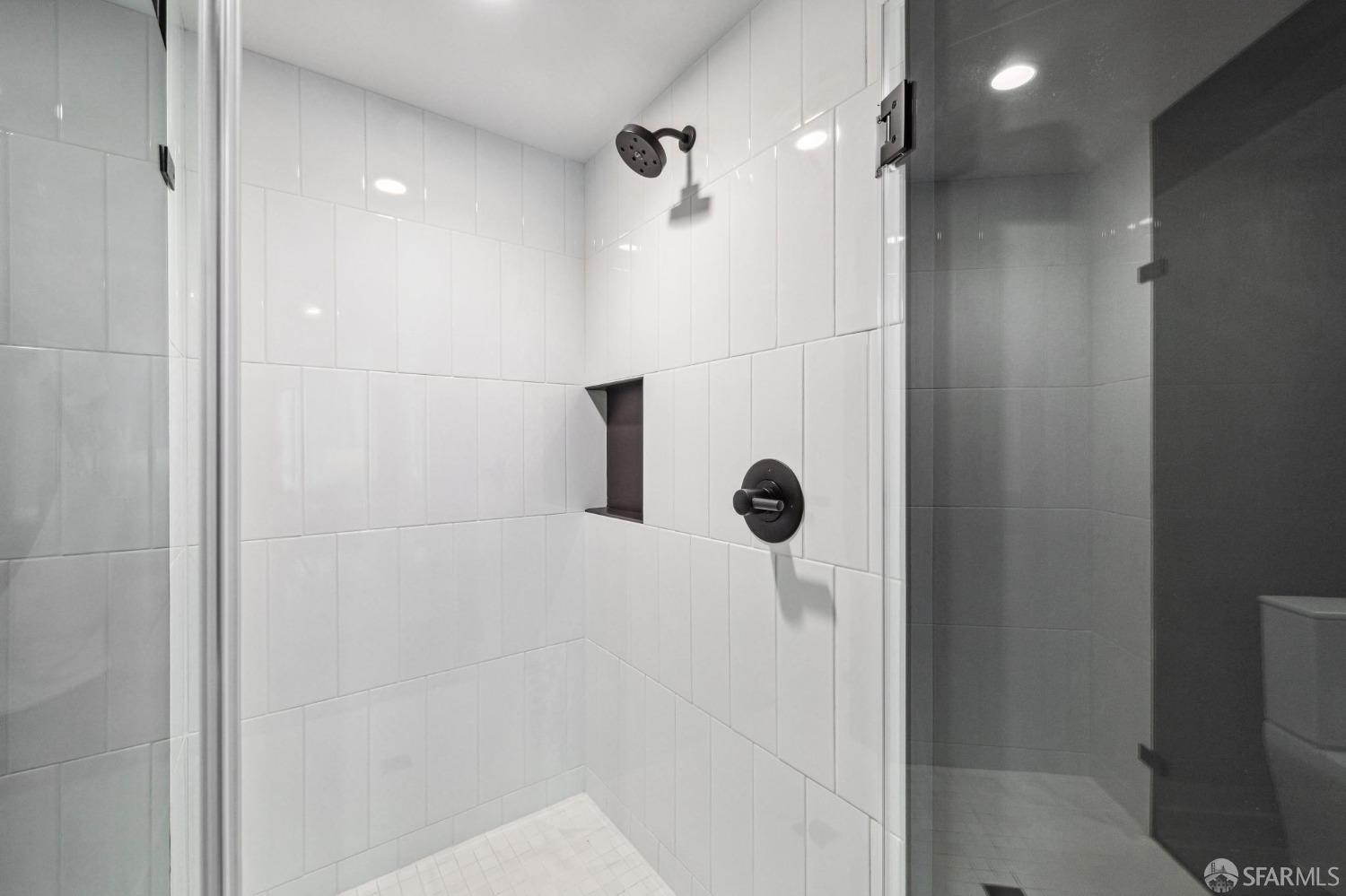 960 Market Street, Unit 808 San Francisco, CA 94102 - Photo 5 of 16 a bathroom with a shower and a shower
