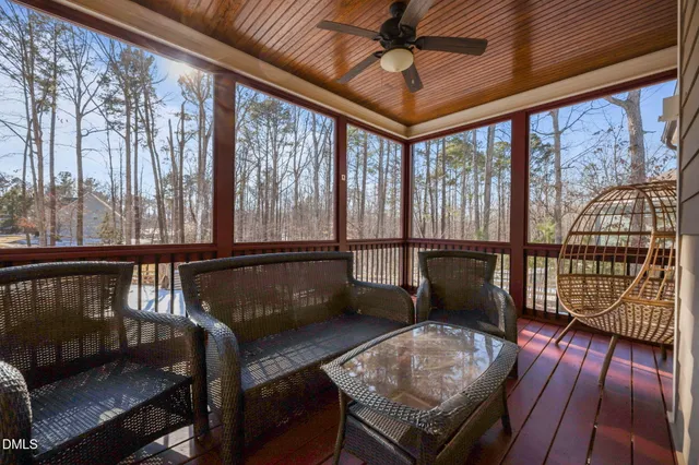 a view of a chairs and tables in the balcony
