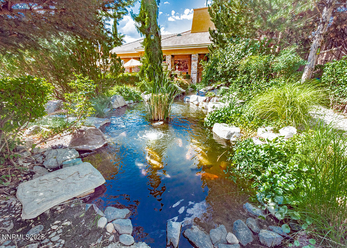 900 South Meadows Parkway, Unit 3223 Reno, NV 89521 - Photo 13 of 42 a front view of a house with a yard