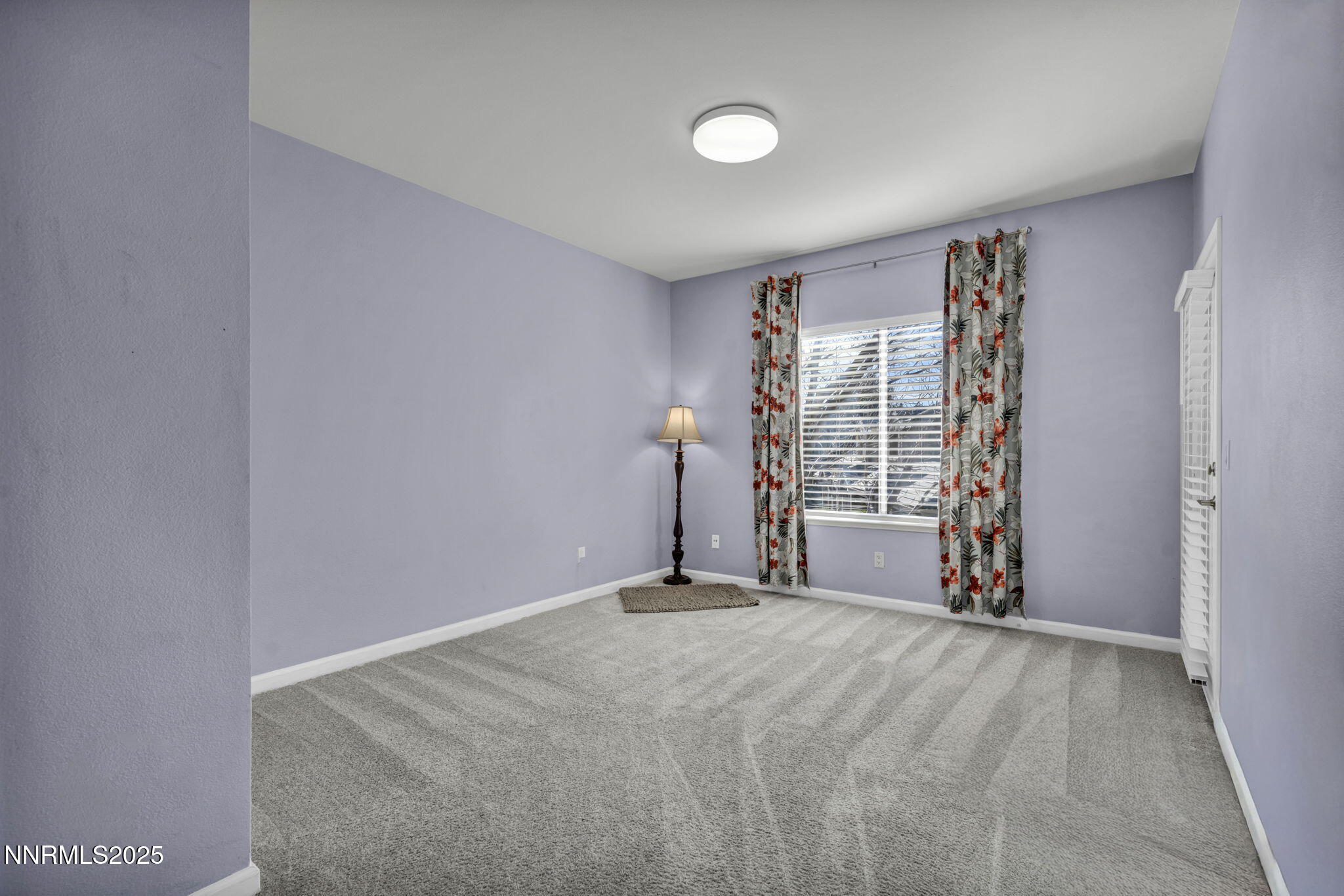 900 South Meadows Parkway, Unit 3223 Reno, NV 89521 - Photo 17 of 42 a view of a room with wooden floor and window