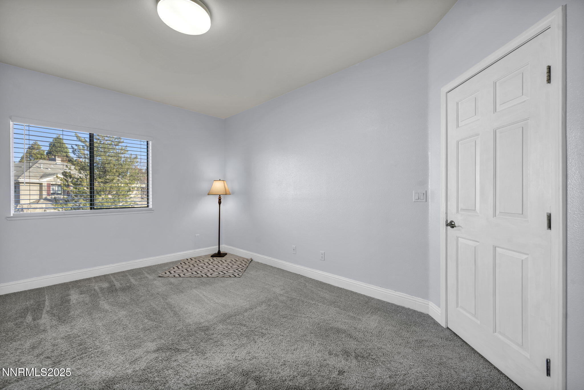 900 South Meadows Parkway, Unit 3223 Reno, NV 89521 - Photo 23 of 42 an empty room with windows